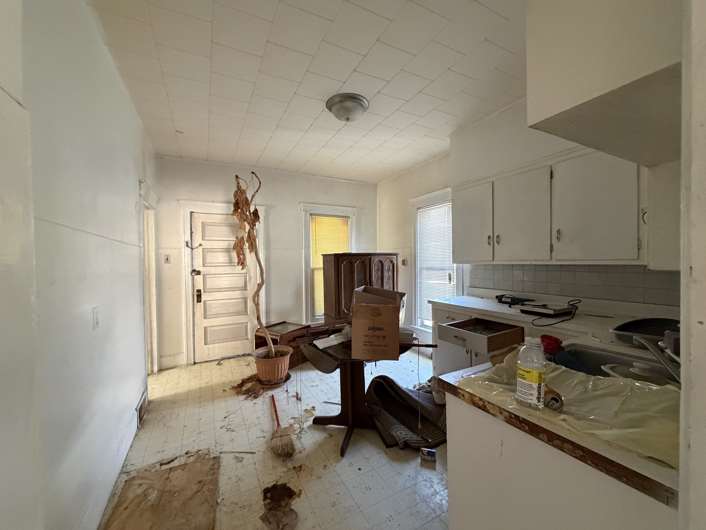 22-24 West Clark Street Freeport, IL 61032 - Photo 4 of 6 a view of a kitchen with refrigerator and a stove