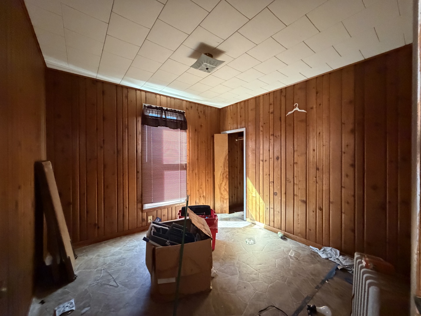 22-24 West Clark Street Freeport, IL 61032 - Photo 5 of 6 a living room with furniture a window and a wooden door