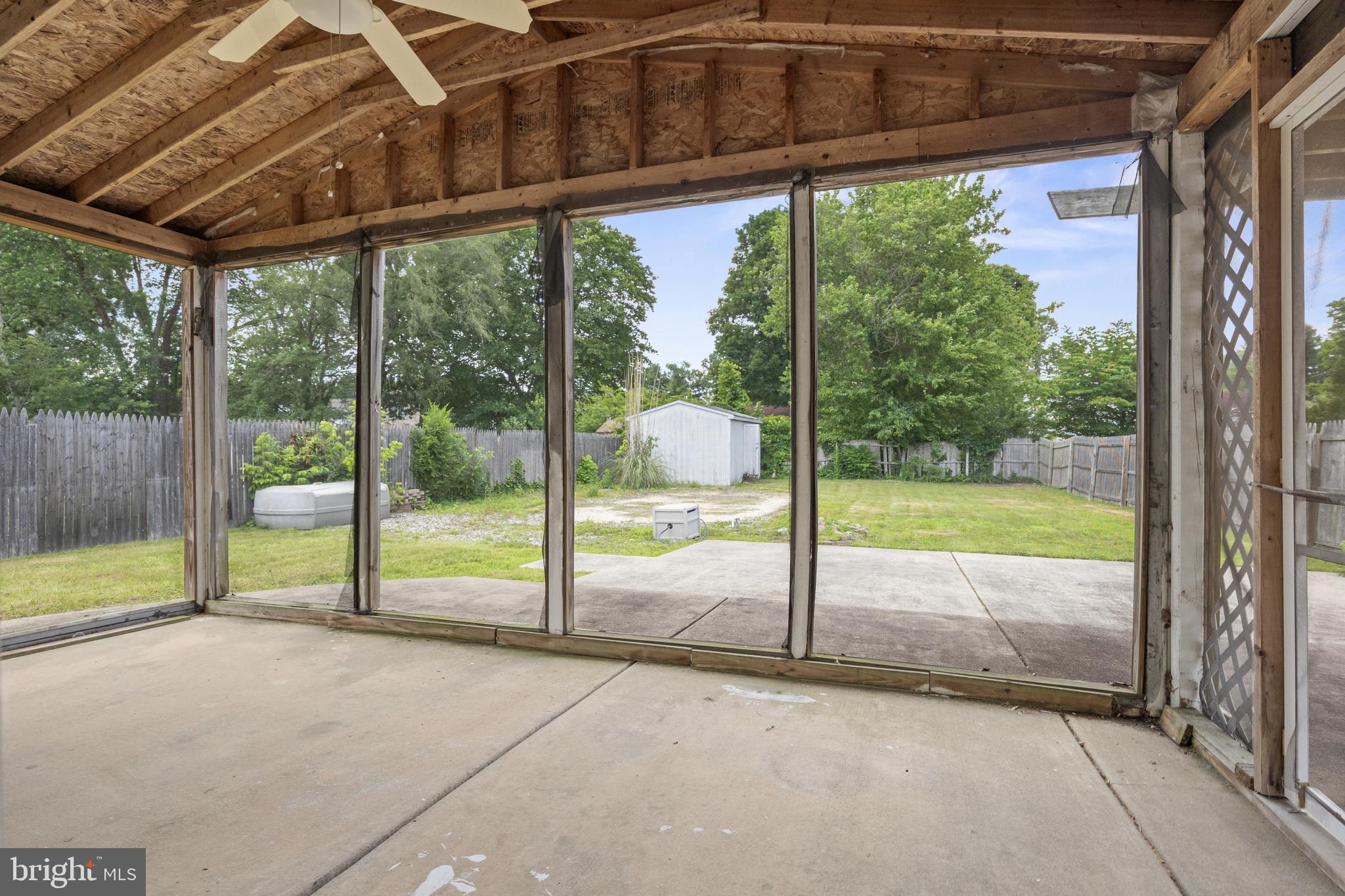 303 Cornell Road Glassboro, NJ 08028 - Photo 21 of 27 a view of a porch with a backyard
