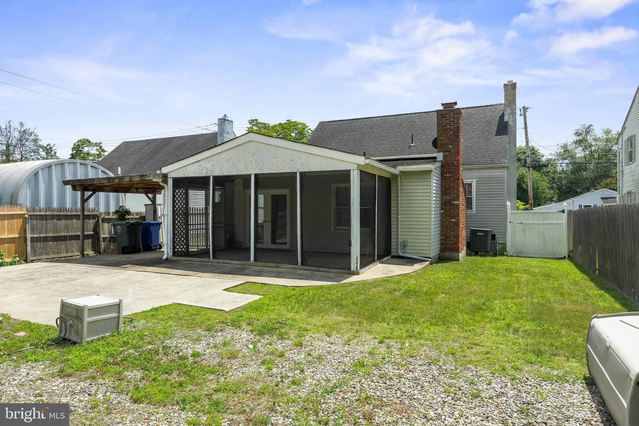 303 Cornell Road Glassboro, NJ 08028 - Photo 25 of 27 a front view of a house with garden