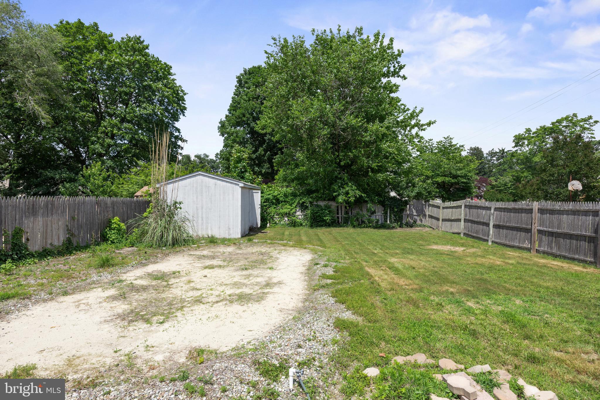 303 Cornell Road Glassboro, NJ 08028 - Photo 27 of 27 a swimming pool with wooden fence