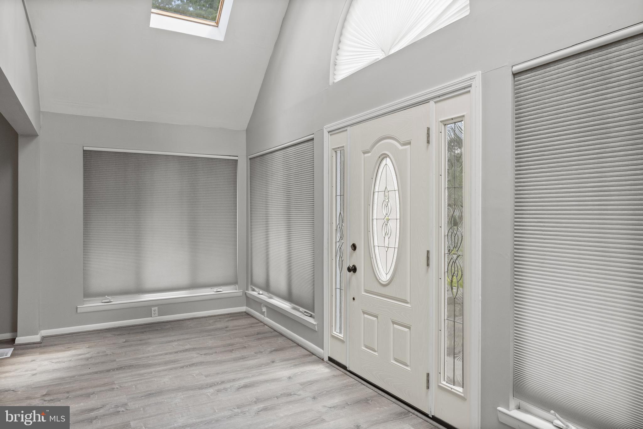 303 Cornell Road Glassboro, NJ 08028 - Photo 4 of 27 a view of entryway with wooden floor