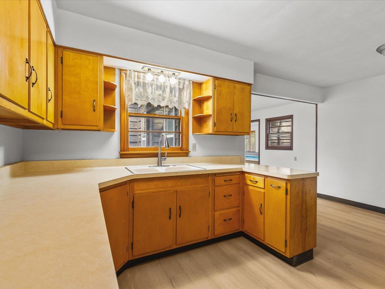 7774 Old River Road Rockford, IL 61103 - Photo 20 of 53 a kitchen with stainless steel appliances granite countertop a sink and a cabinets