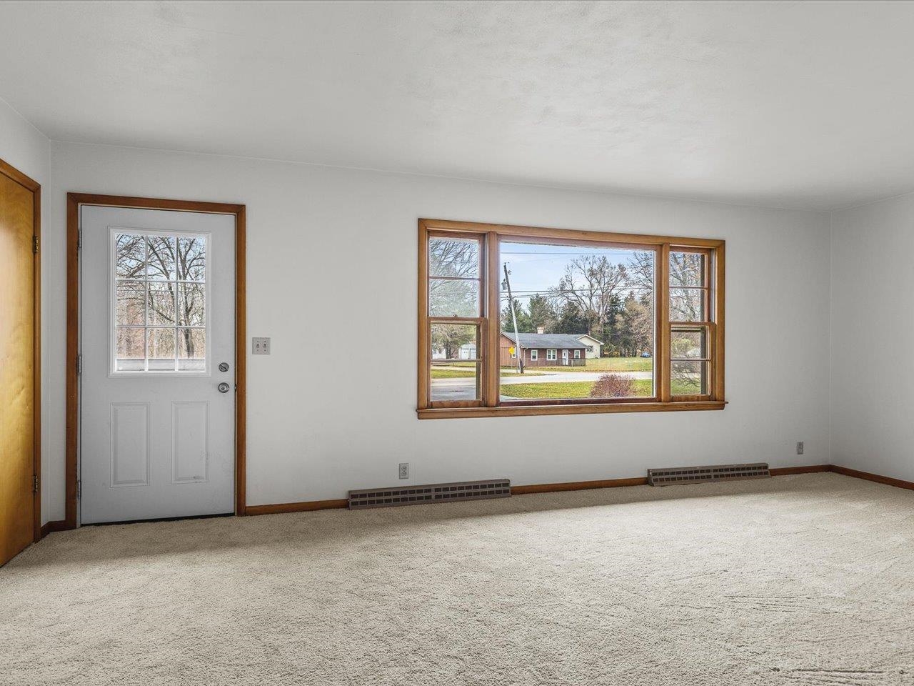 7774 Old River Road Rockford, IL 61103 - Photo 37 of 53 an empty room with windows