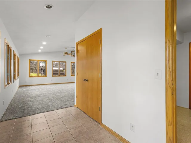 a dining room with a table and chairs