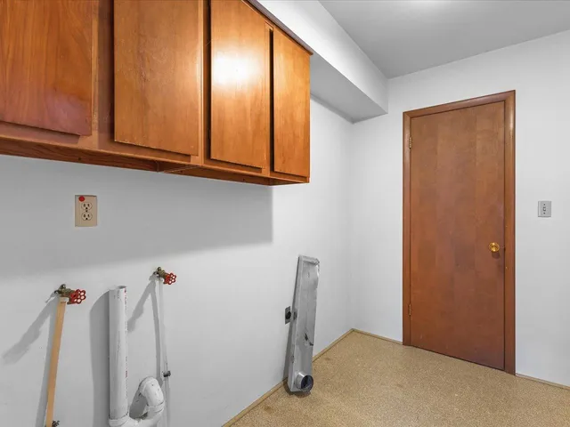 a room with furniture and stairs