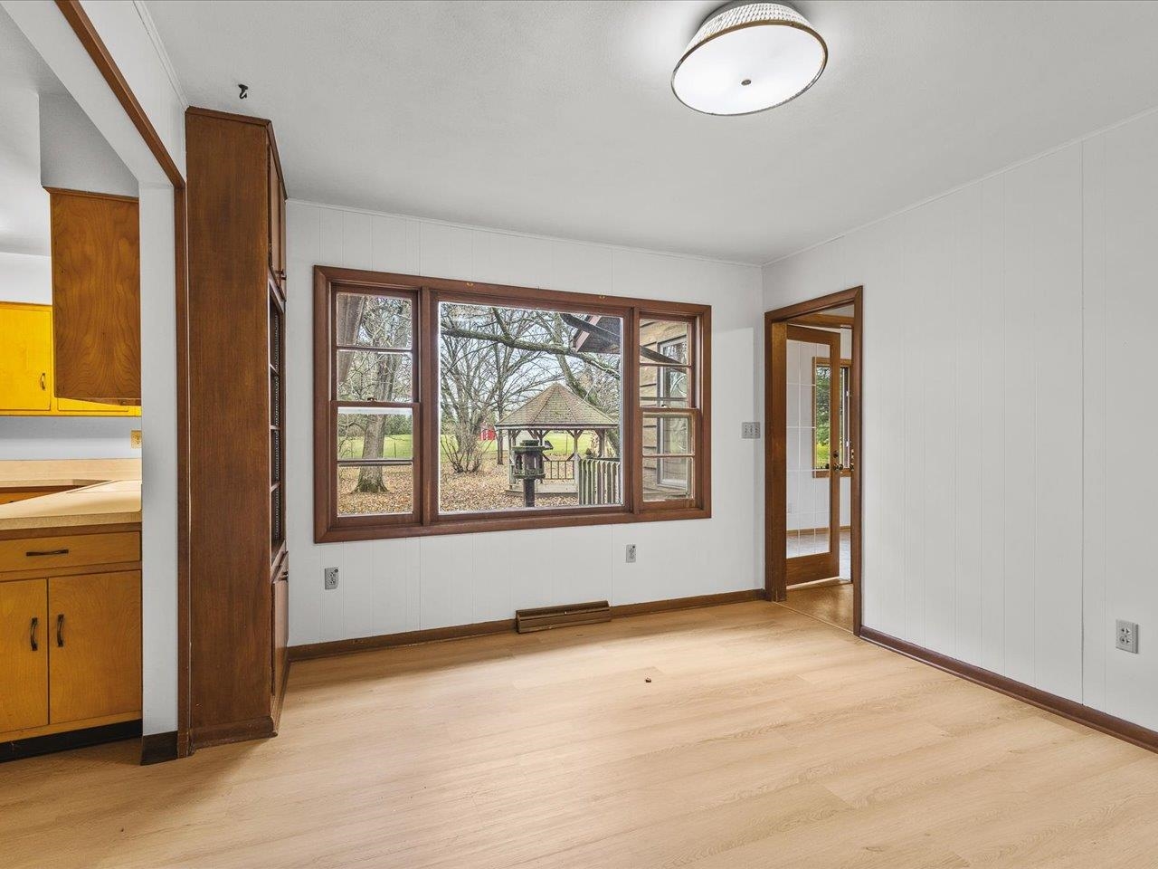 7774 Old River Road Rockford, IL 61103 - Photo 9 of 53 an empty room with window