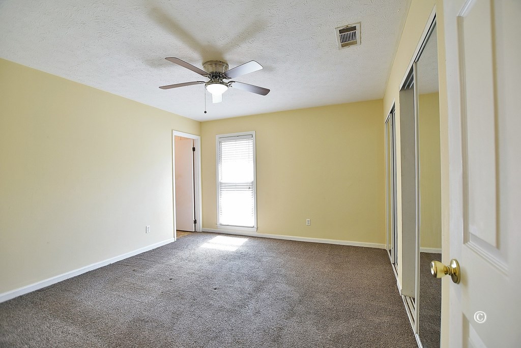 6321 Milgen Road, Unit 4 Columbus, GA 31907 - Photo 9 of 16 Primary Bedroom