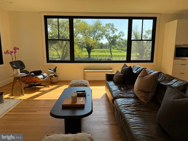 a room with a couch and a window