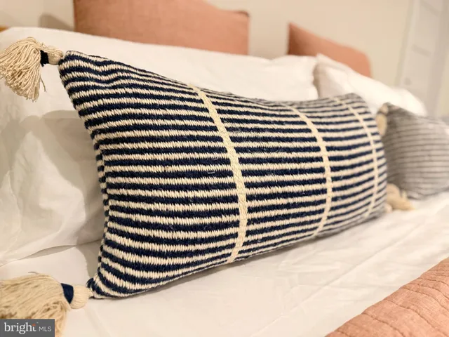 a kitchen with a refrigerator and a window