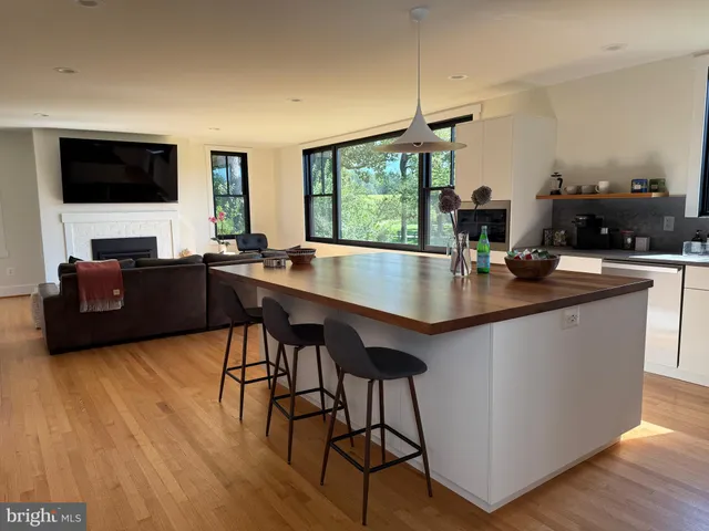 a view of cabinets and with wooden floor