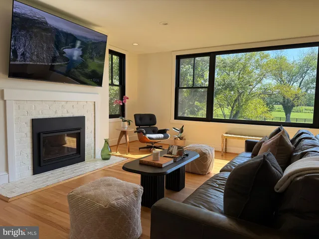 a view of a living room and dining room