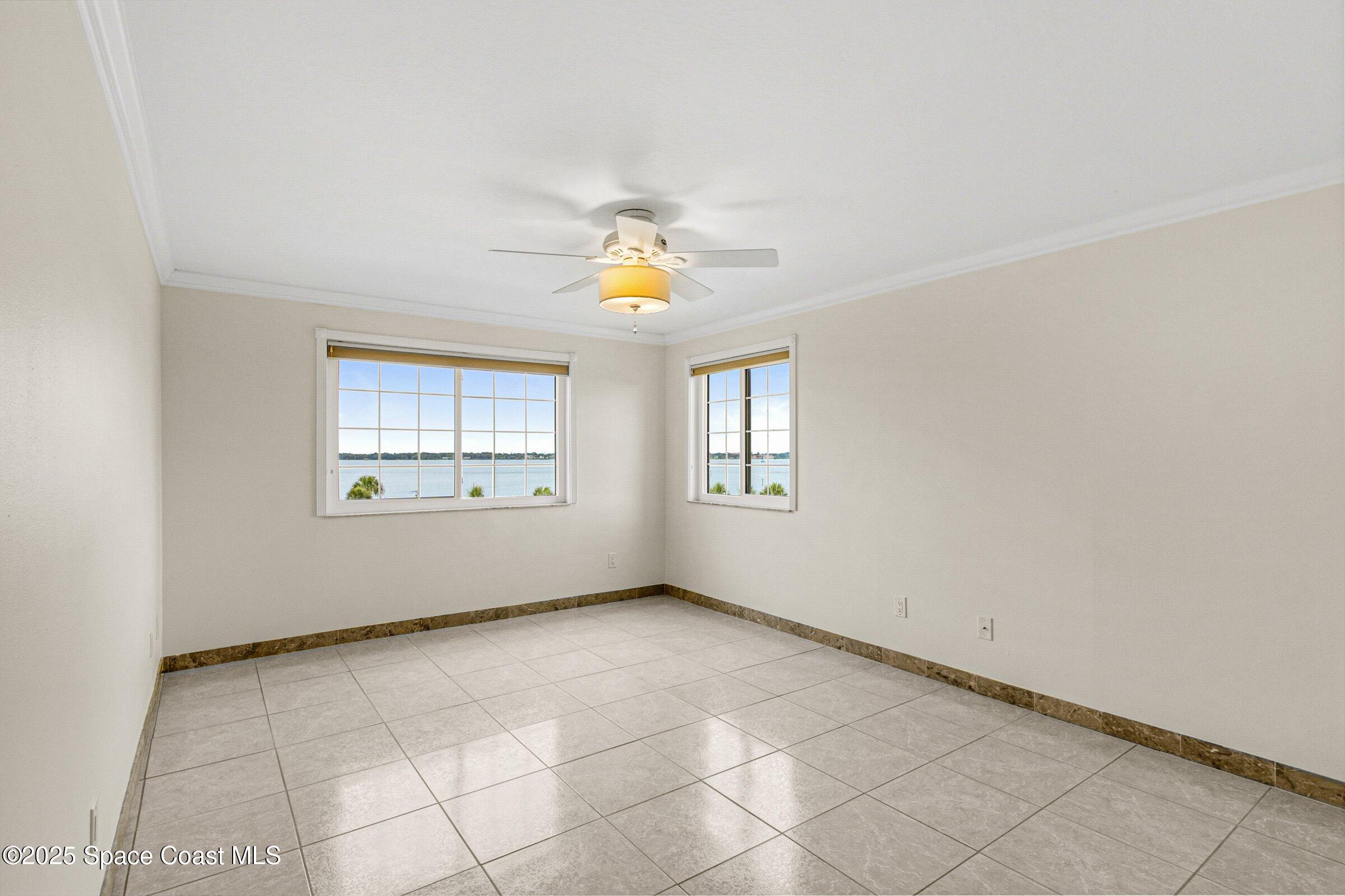 115 Indian River Drive, Unit 327 Cocoa, FL 32922 - Photo 16 of 47 a view of an empty room with a window
