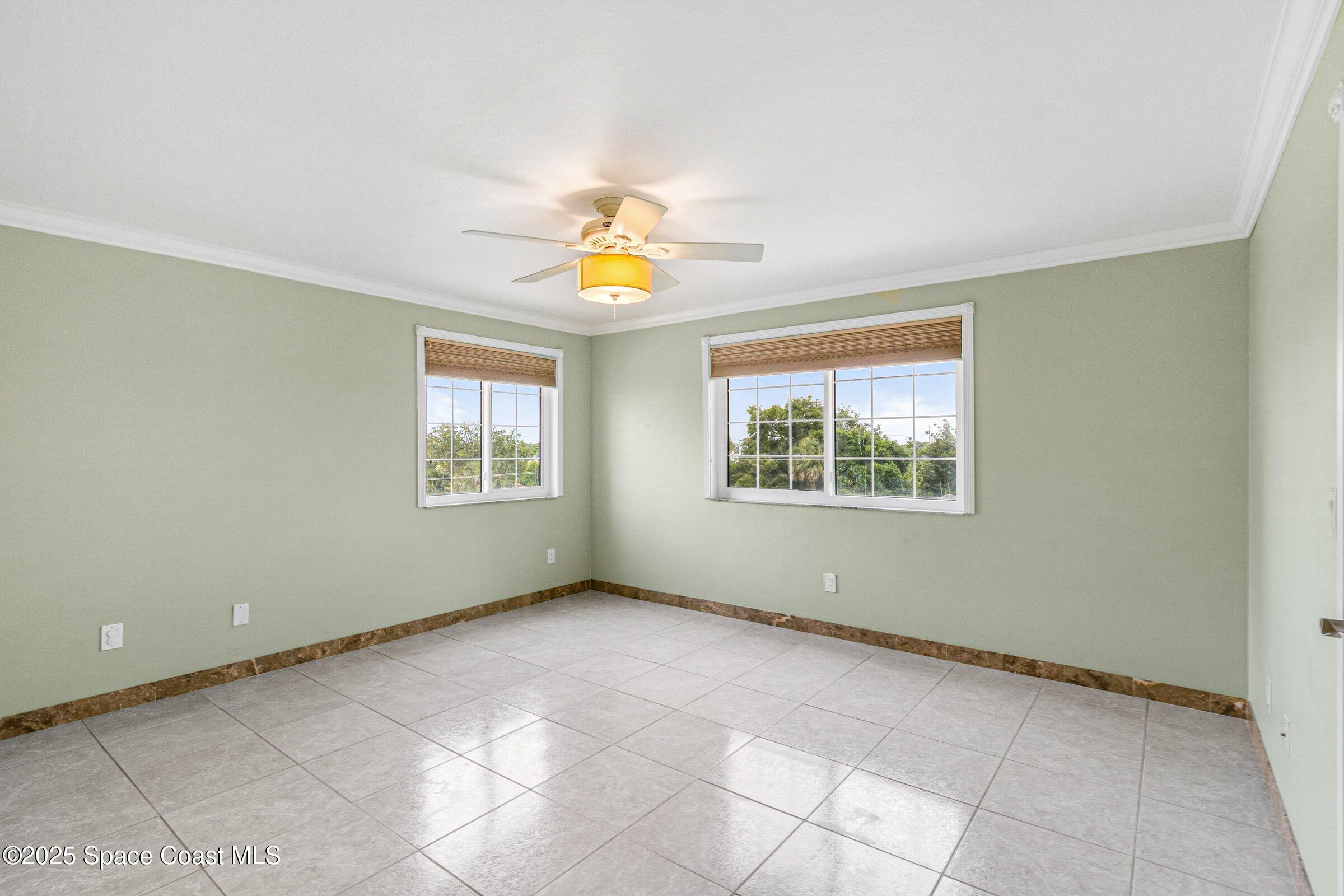115 Indian River Drive, Unit 327 Cocoa, FL 32922 - Photo 21 of 47 an empty room with windows