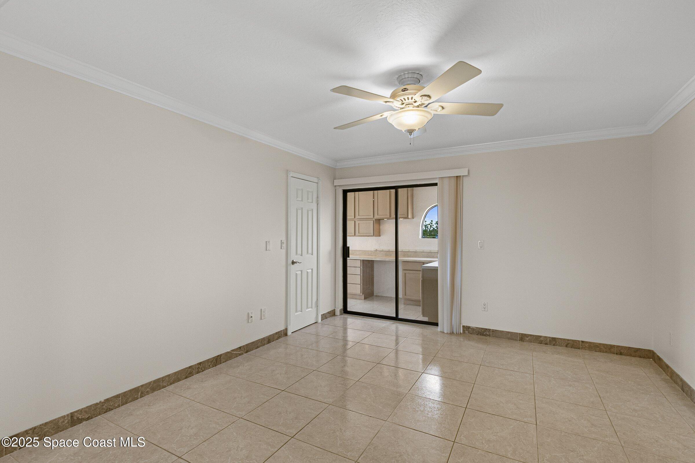 115 Indian River Drive, Unit 327 Cocoa, FL 32922 - Photo 25 of 47 a view of an empty room with chandelier fan