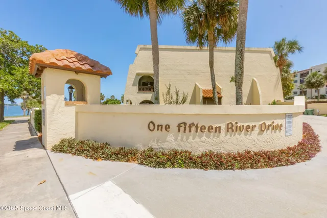 a view of a house with a road