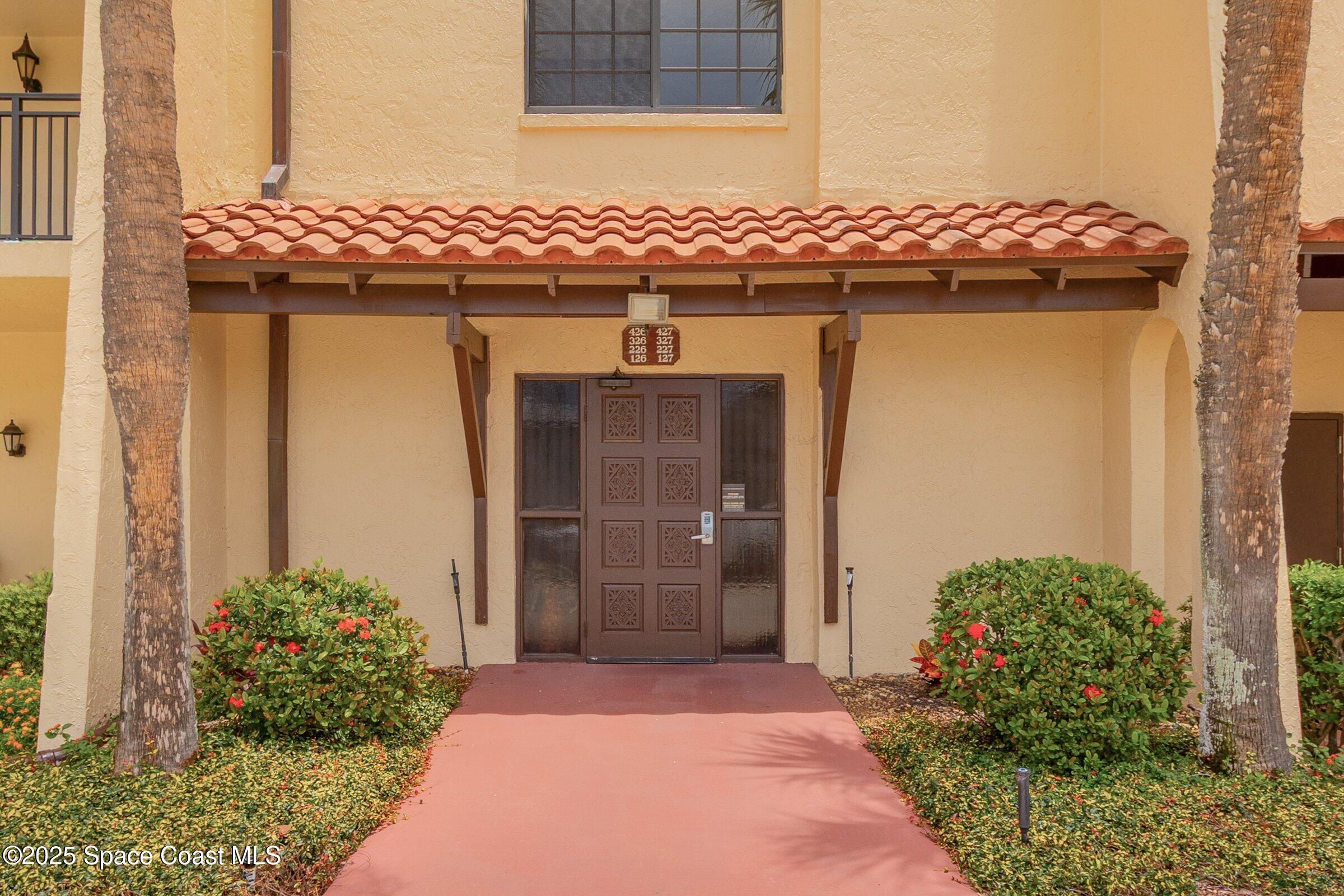 115 Indian River Drive, Unit 327 Cocoa, FL 32922 - Photo 3 of 47 a front view of a house