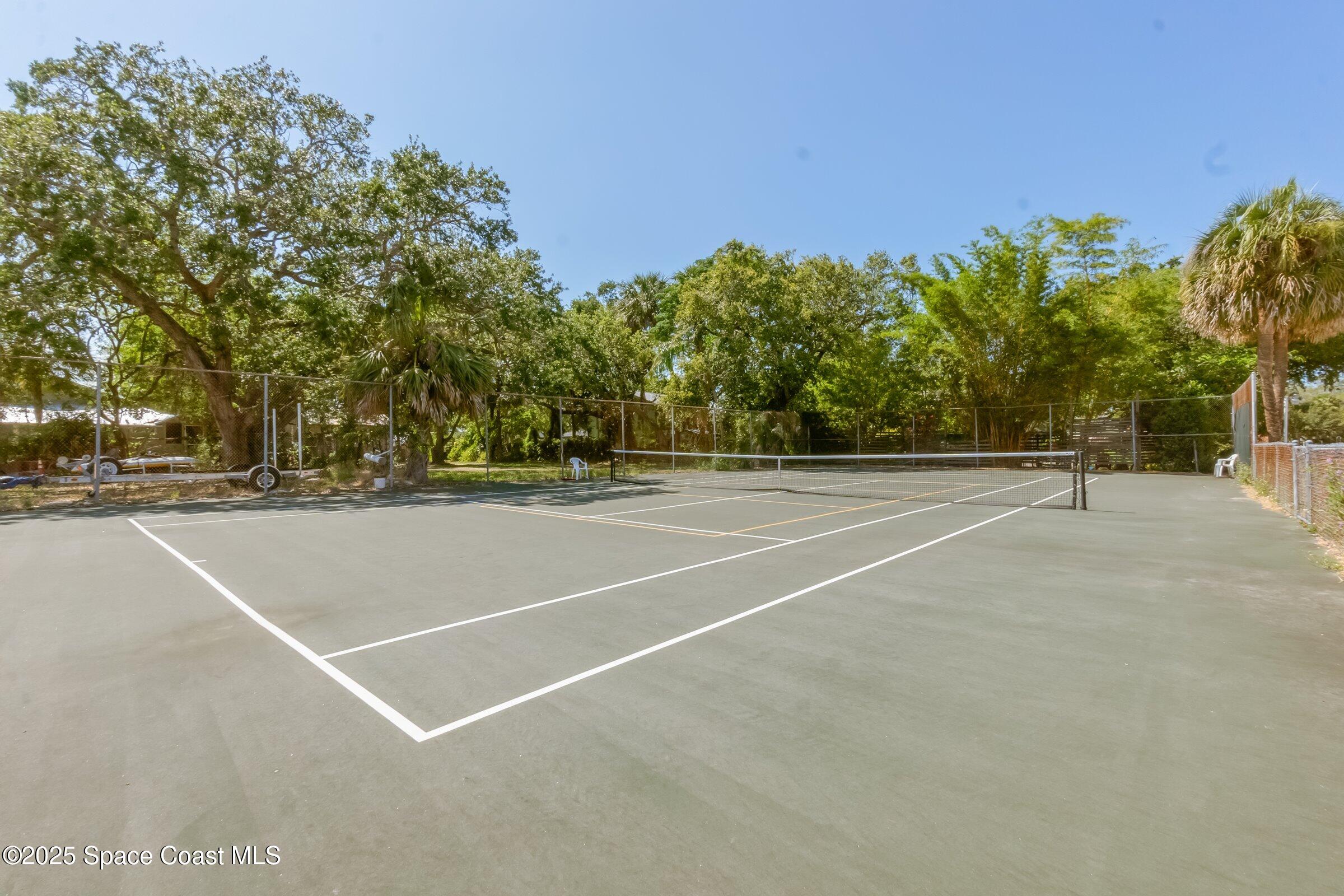 115 Indian River Drive, Unit 327 Cocoa, FL 32922 - Photo 33 of 47 a view of a tennis court