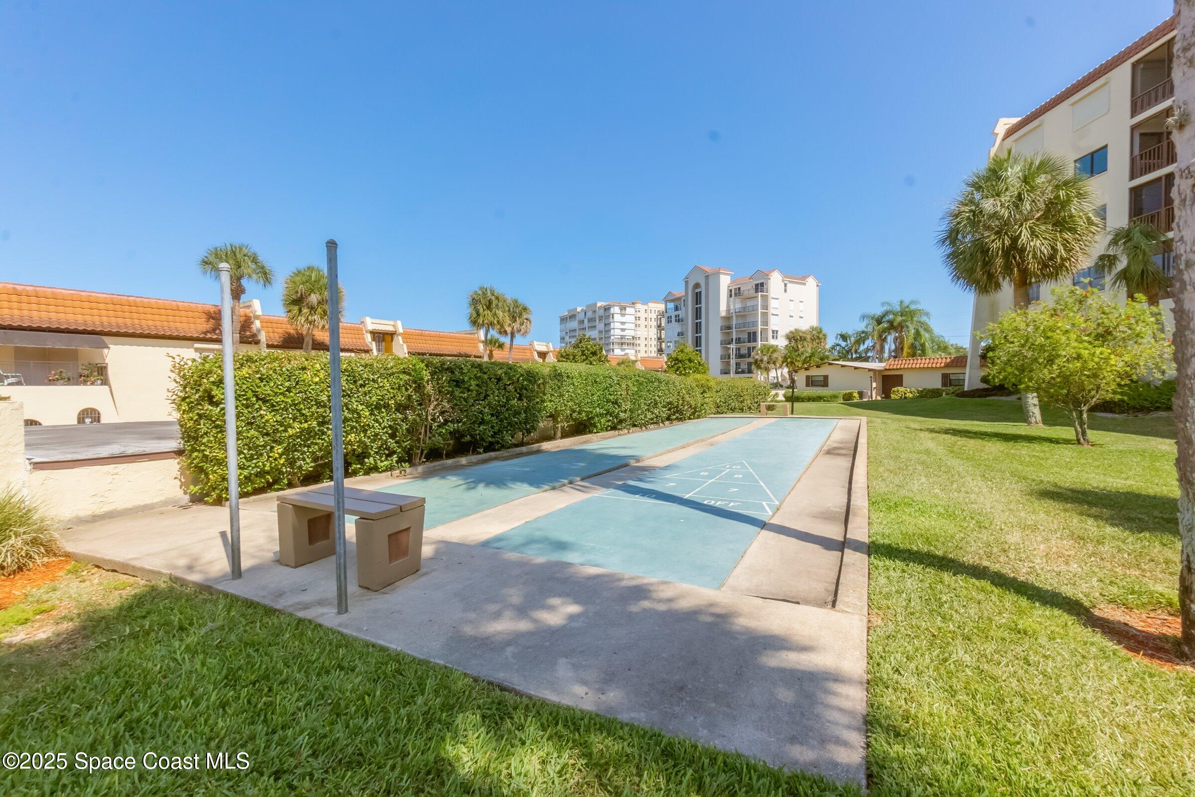 115 Indian River Drive, Unit 327 Cocoa, FL 32922 - Photo 34 of 47 a view of a patio with a table and chairs