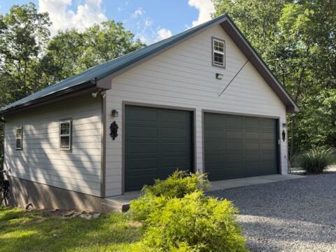343 Highlands Forest Road Rising Fawn, GA 30738 - Photo 50 of 75 Garage with storage room