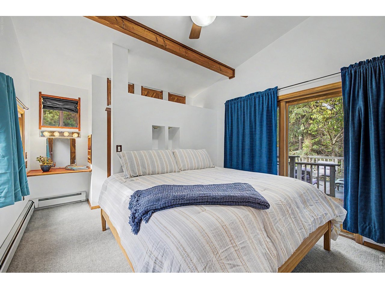 208 Packer Gulch Road Boulder, CO 80302 - Photo 16 of 41 Primary Bedroom w/ access to deck