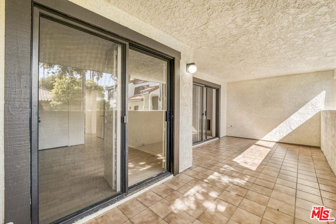 2053 Majorca Drive Oxnard, CA 93035 - Photo 11 of 15 a view of a glass door and window