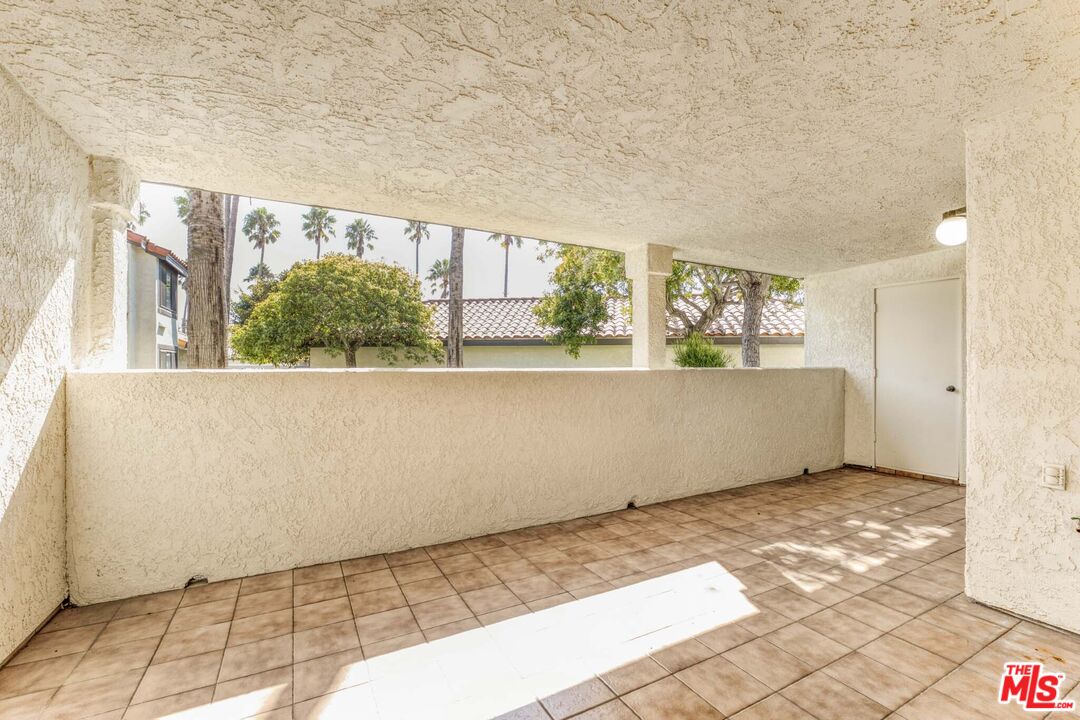 2053 Majorca Drive Oxnard, CA 93035 - Photo 10 of 15 a view of wooden floor and windows in a room
