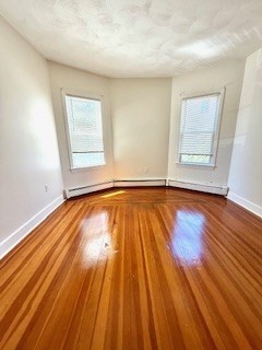 38 Hecla Street, Unit 1 Boston, MA 02122 - Photo 2 of 7 a view of wooden floor in a room