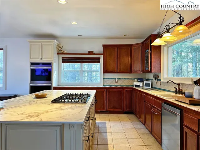 a view of a workspace with furniture