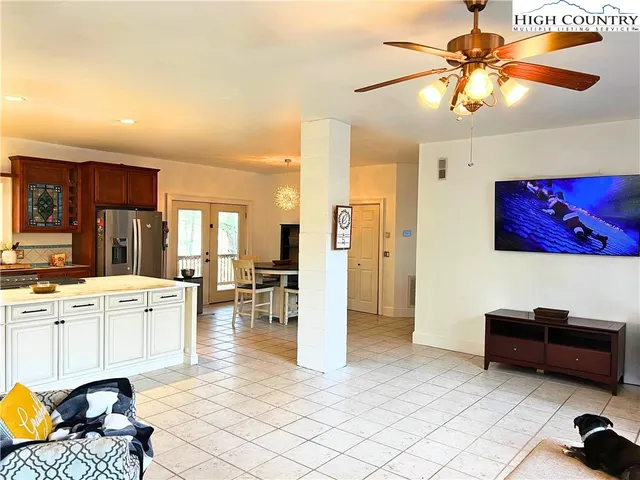 a kitchen with a sink and wooden cabinets