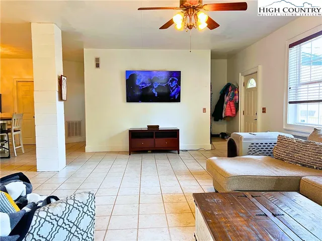 a kitchen with a sink cabinets and window
