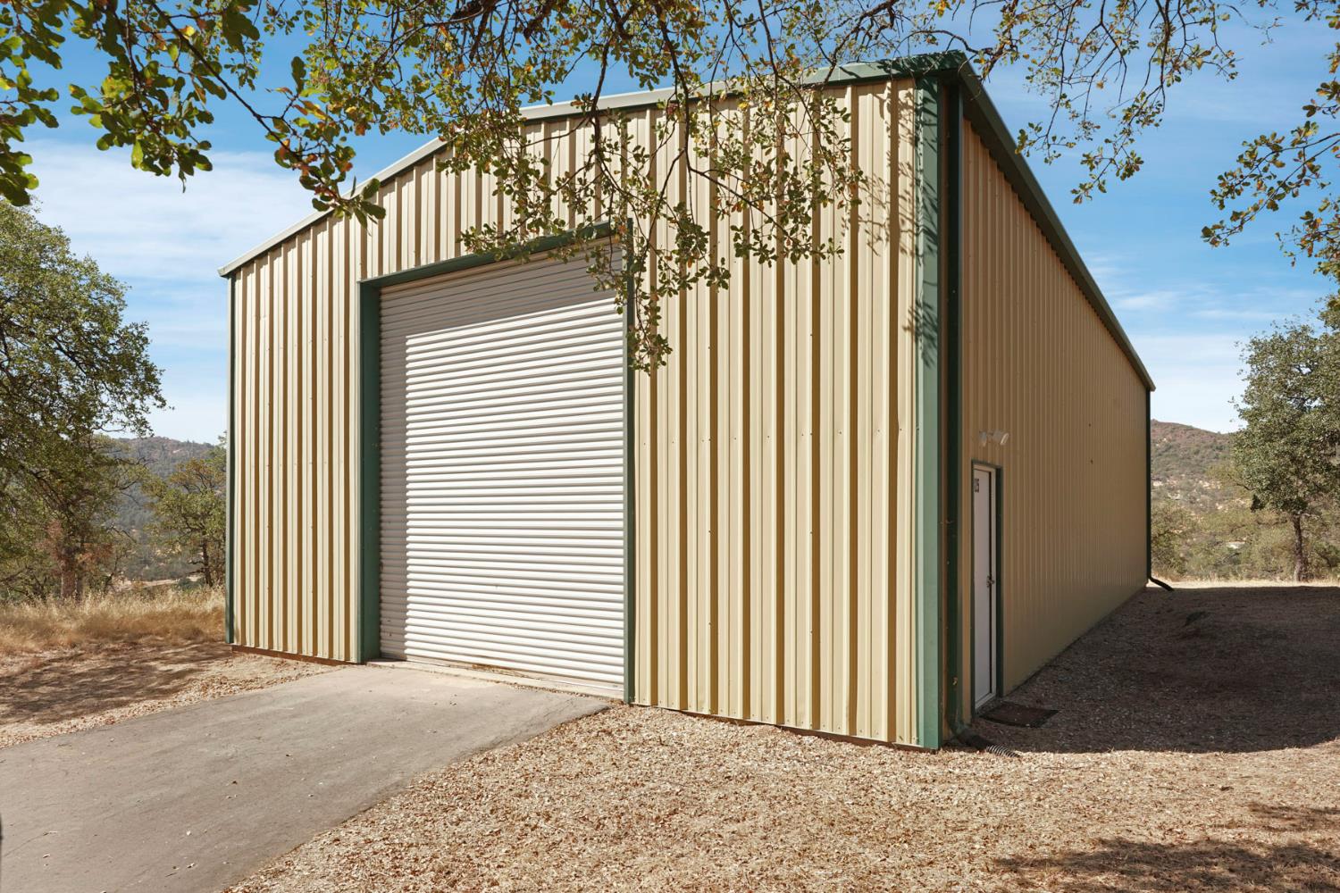 7425 Cincha Street Angels Camp, CA 95222 - Photo 3 of 29 a view of a house with a backyard