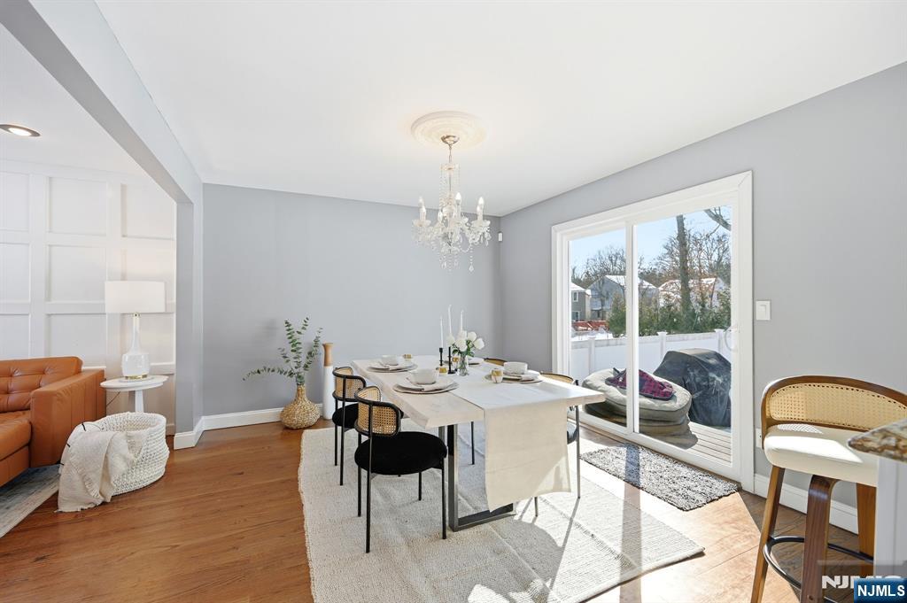 26 East Harrison Place Livingston, NJ 07039 - Photo 13 of 42 a view of a dining room with furniture window and outside view
