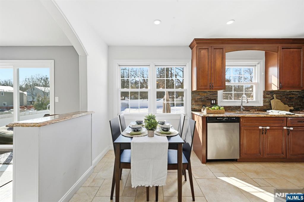26 East Harrison Place Livingston, NJ 07039 - Photo 16 of 42 a dining room with furniture and window