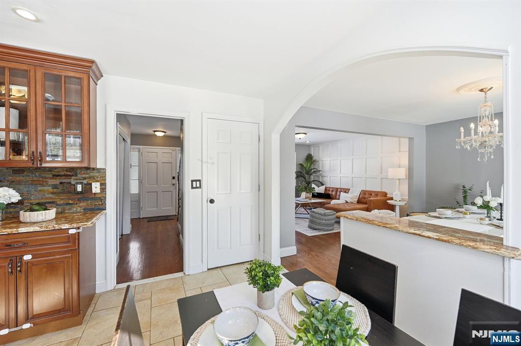 26 East Harrison Place Livingston, NJ 07039 - Photo 23 of 42 a kitchen with a sink stove and refrigerator