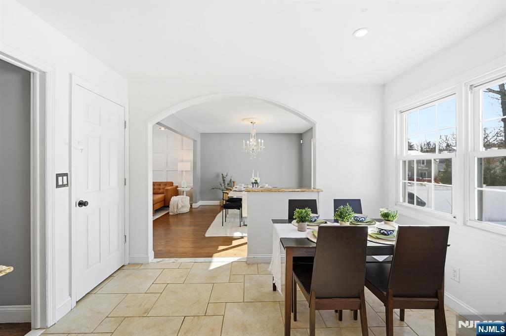 26 East Harrison Place Livingston, NJ 07039 - Photo 25 of 42 a view of a dining room with furniture