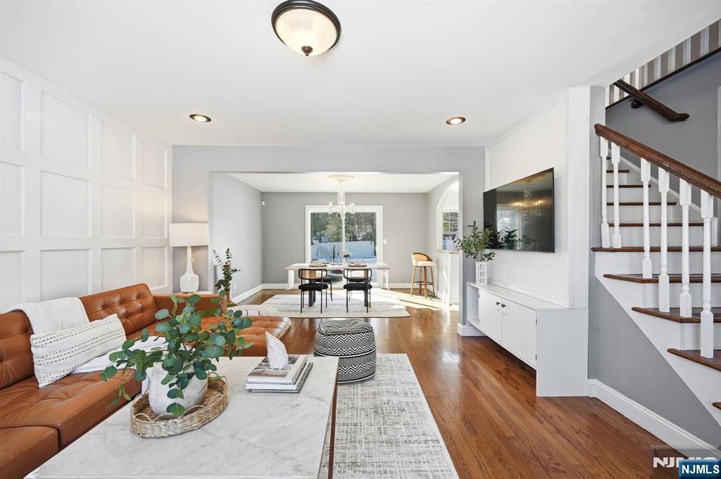 26 East Harrison Place Livingston, NJ 07039 - Photo 7 of 42 a living room with furniture and a flat screen tv