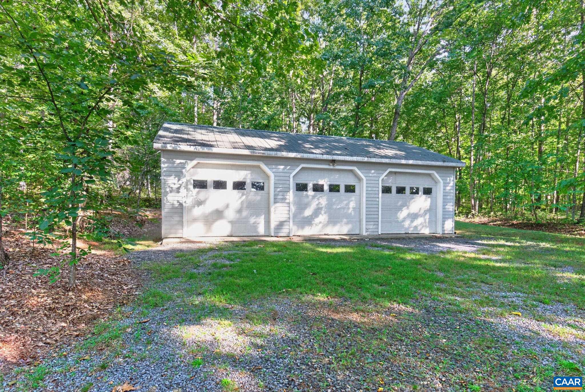 5363 Stony Point Road Barboursville, VA 22923 - Photo 57 of 66 Another very spacious area with metal roof and a Wood Burning Stove inside plus workbenches. This could hold at least 6 vehicles or could be used for storage or multiple other uses. This garage is being sold "AS IS".