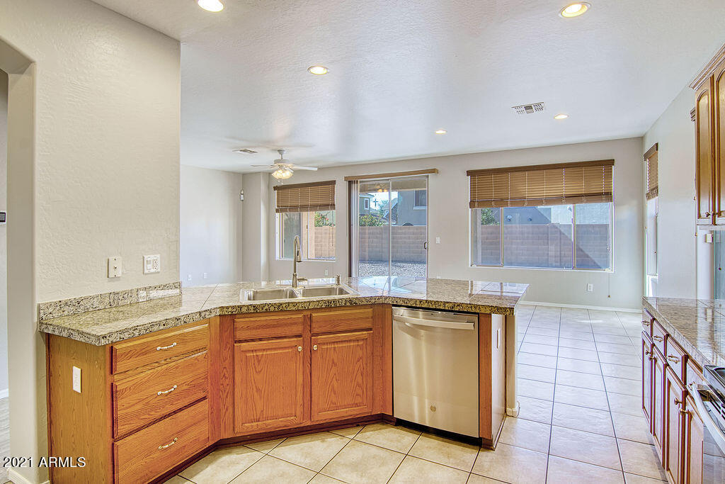 35210 North 30th Drive Phoenix, AZ 85086 - Photo 11 of 37 a kitchen with a sink and cabinets