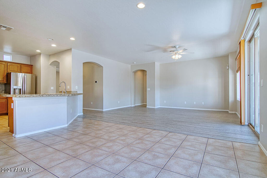 35210 North 30th Drive Phoenix, AZ 85086 - Photo 12 of 37 a view of a kitchen with a sink and a refrigerator