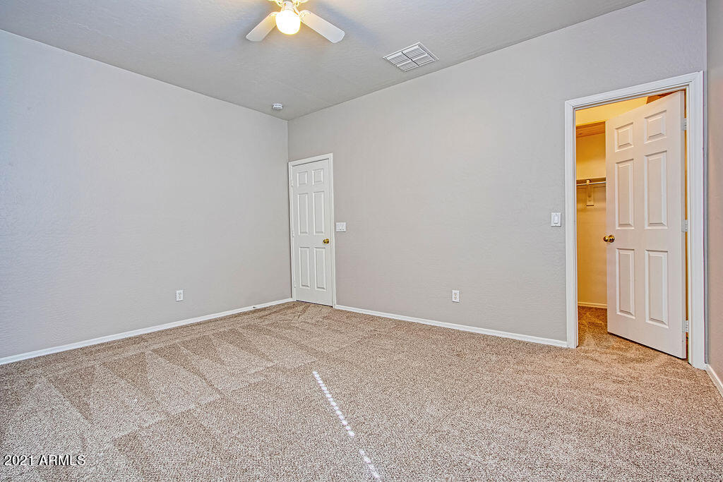 35210 North 30th Drive Phoenix, AZ 85086 - Photo 26 of 37 a view of an empty room with a window