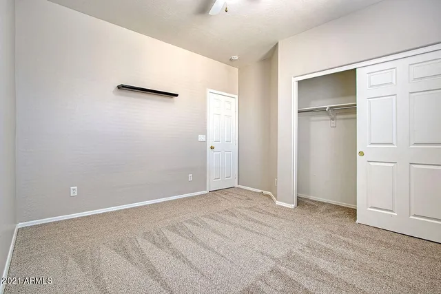 an empty room with closet