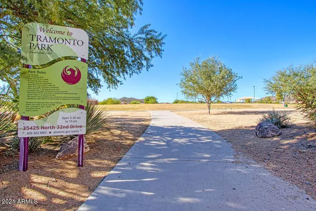 a view of a street with an outdoor space