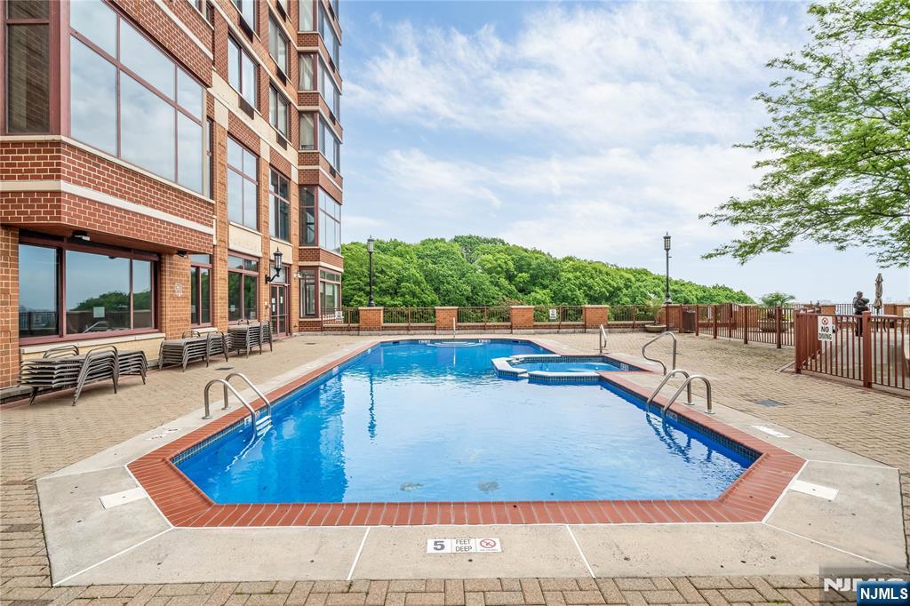 100 Old Palisade Road, Unit 1710 Fort Lee, NJ 07024 - Photo 6 of 8 a view of a swimming pool