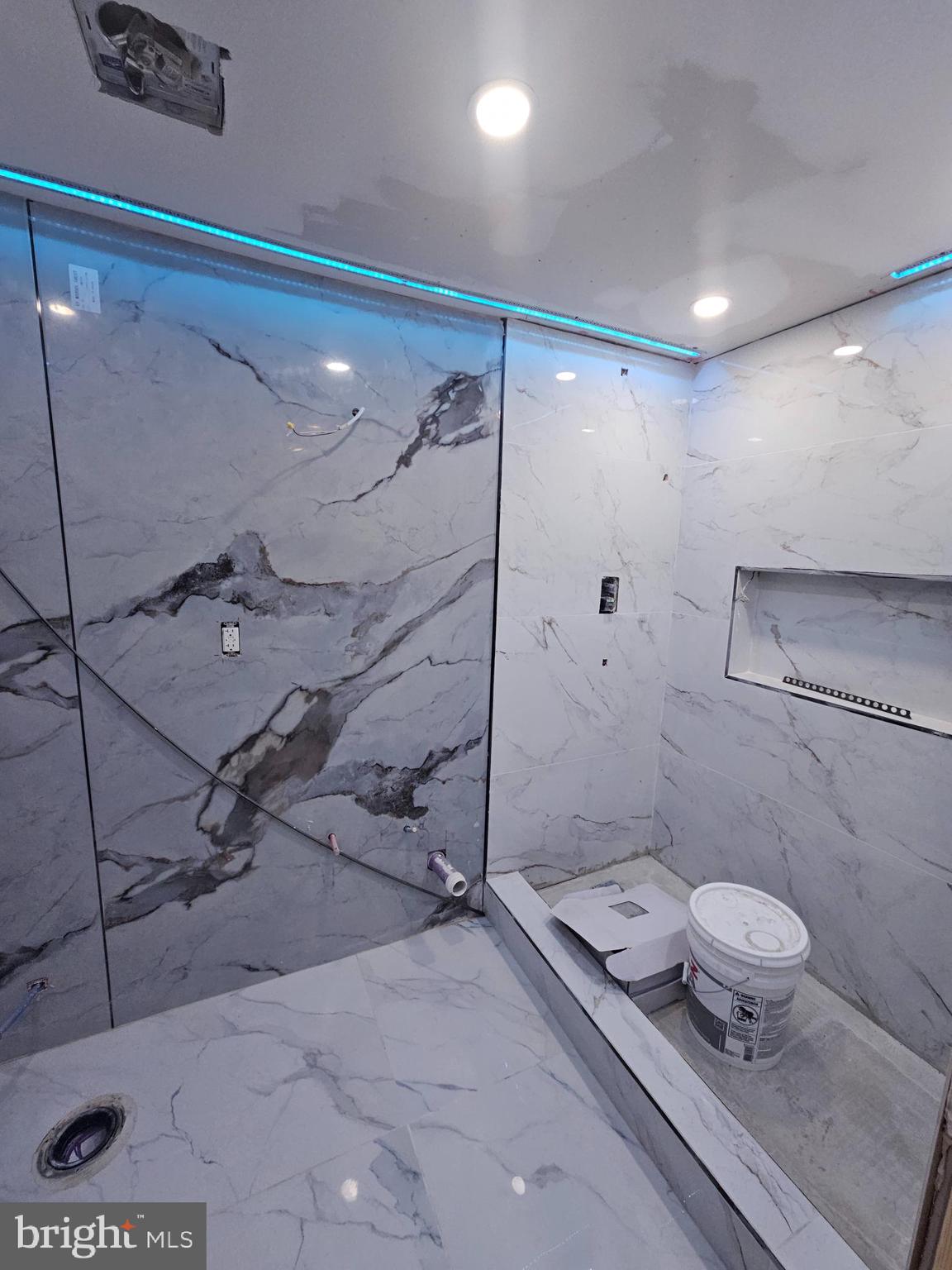 6047 Race Street Philadelphia, PA 19139 - Photo 19 of 23 a bathroom with a toilet a sink and shower