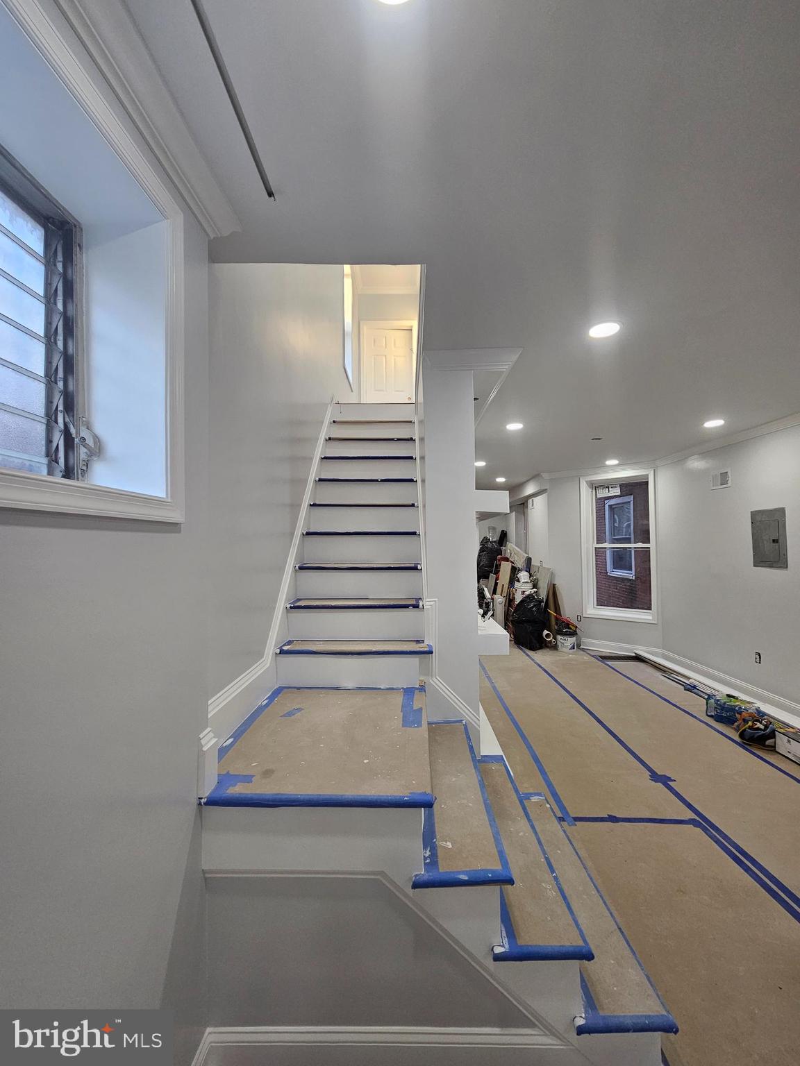 6047 Race Street Philadelphia, PA 19139 - Photo 3 of 23 a room with gym equipment and a large window