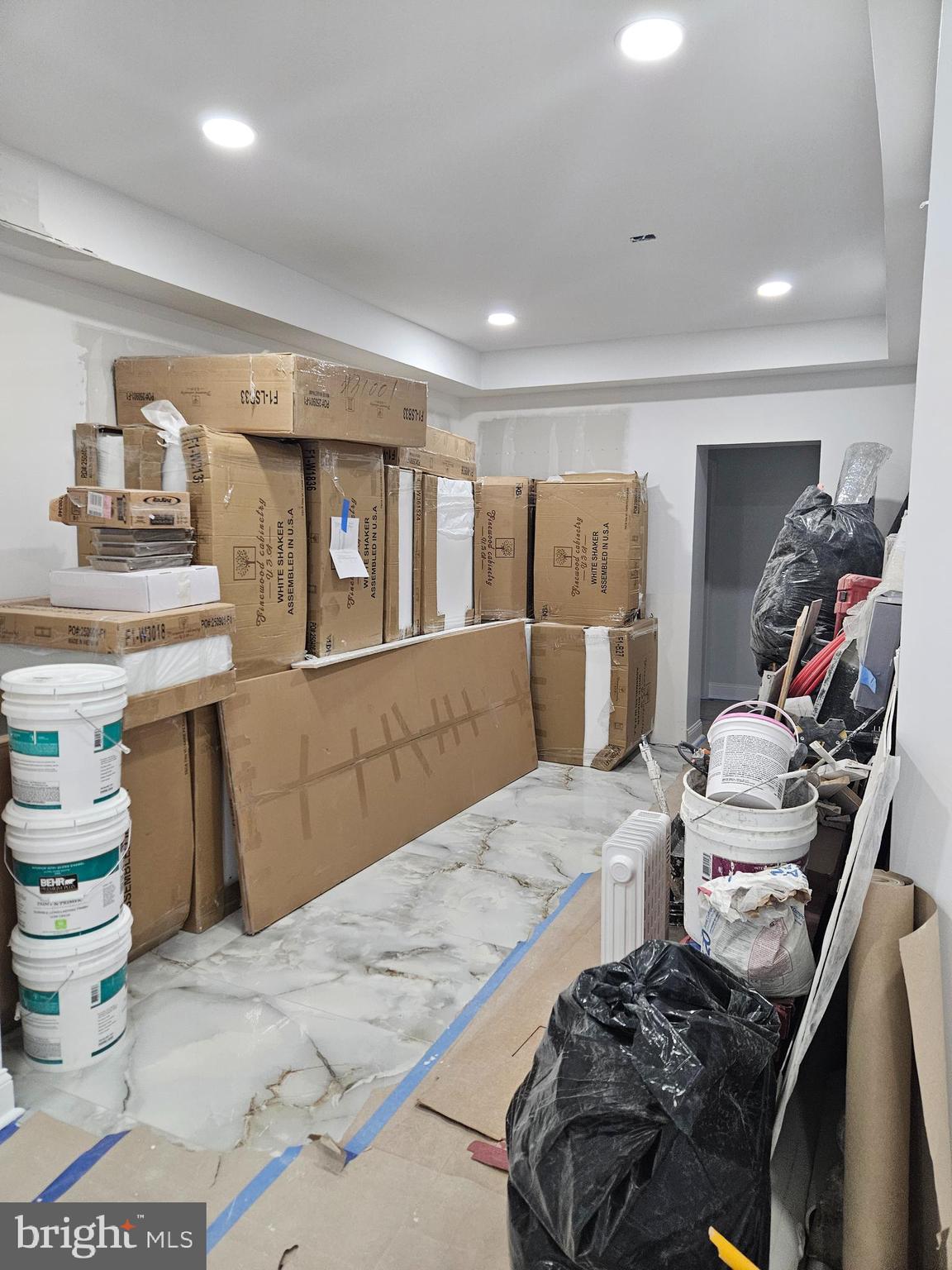 6047 Race Street Philadelphia, PA 19139 - Photo 6 of 23 a bedroom with a bed and a mirror on the dresser