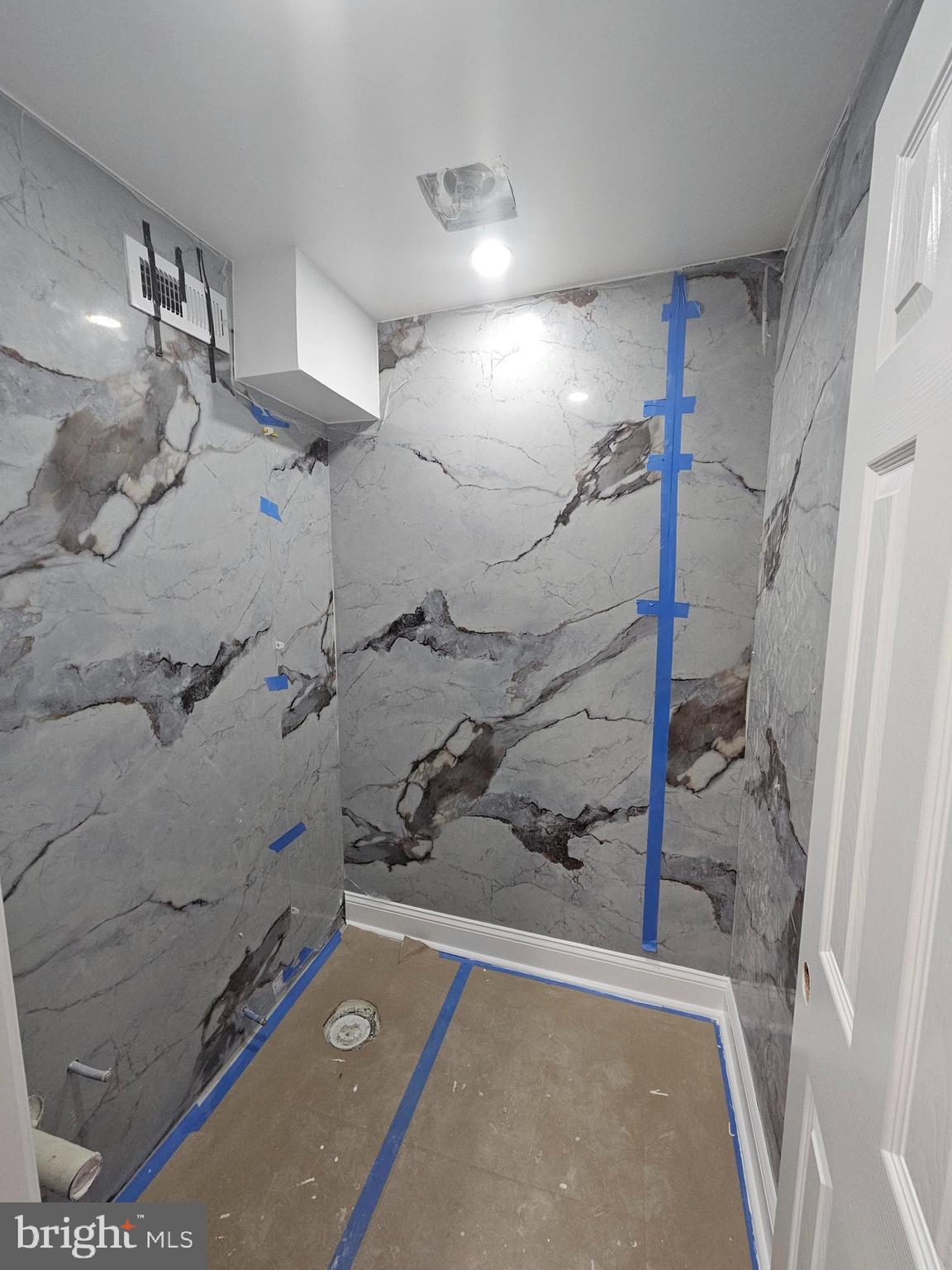 6047 Race Street Philadelphia, PA 19139 - Photo 7 of 23 a bathroom with a shower and a sink