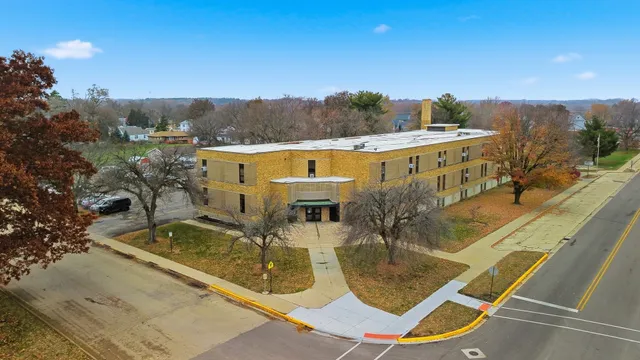 a view of a swimming pool with a patio