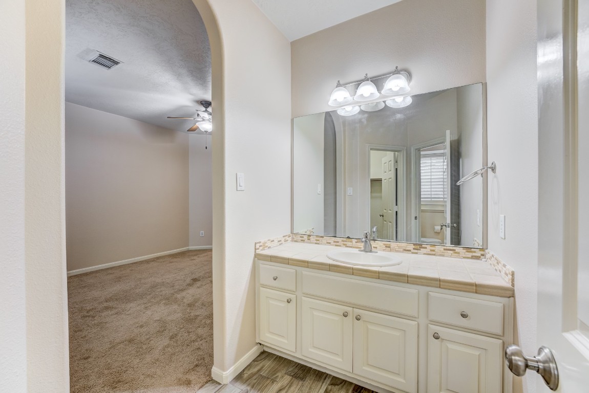 7938 Wooded Way Drive Spring, TX 77389 - Photo 25 of 47 Jack and Jill Bath centered between the 4th and 5th Bed rooms